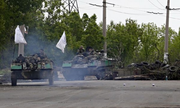 Pro-Russia gunmen on armored personal carriers