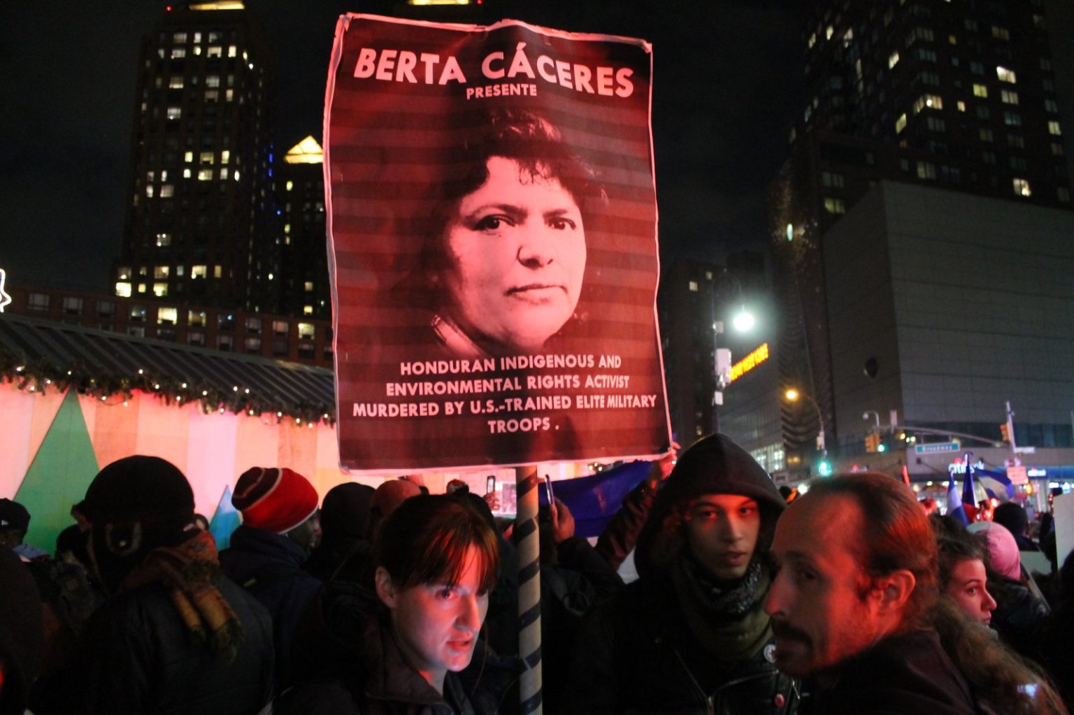 A sign depicts the slain environmental activist Berta Cáceres during a protest on December 4, 2017, in Manhattan. (Photo from Joe Catron, Flickr, CC BY-NC 2.0)