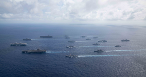 Photo of multiple carrier strike groups operating in the Asia-Pacific region