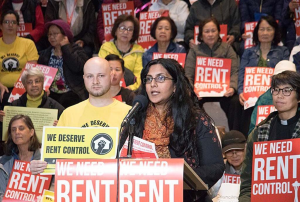 Kshama Sawant speaking at a rally for rent control