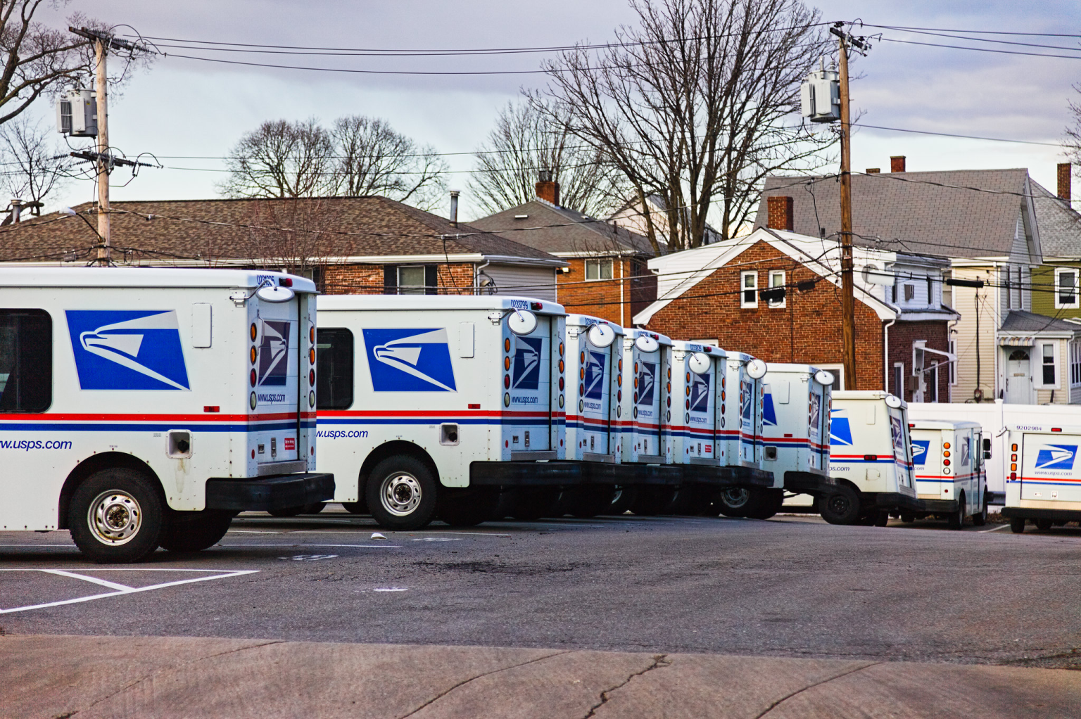 USPS Privatization Would Cost Rural America More Than Mail United States Postal Service mail trucks lined up at the Waltham, Massachusetts mail handling facility.
