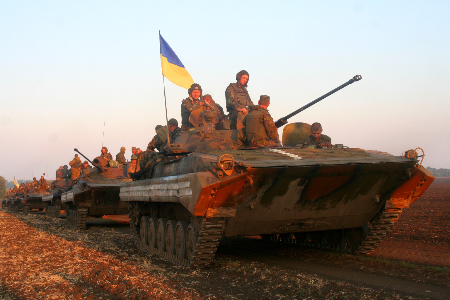 In Ukraine, the Desire to Sacrifice Oneself for the State Is Weak Ukrainian soldiers sit atop tanks in an armored column