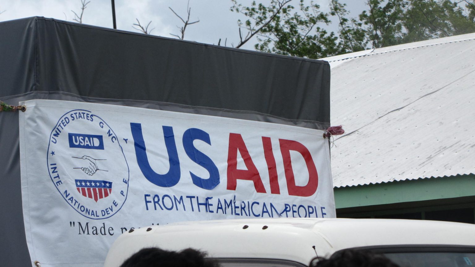 Western-Backed NGOs: A Hollow Version of Civil Society Photo of a USAID banner