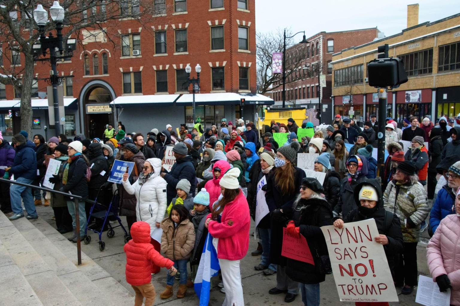 Photo of a rally, where a sign reading “Lynn says NO! to Trump” can be seen