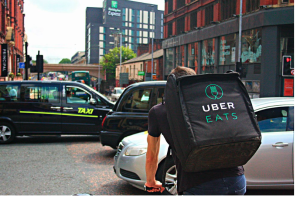 Image of an Uber Eats gig worker